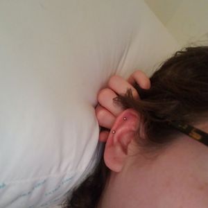 Two helix piercings - right ear