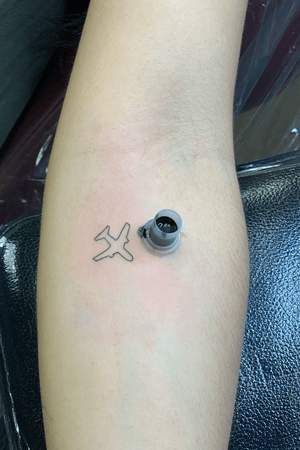 Sungle needle tattoo