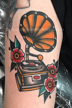 Tradional Gramaphone tattoo on upper arm. Tattooed at Snake and Tiger Tattoo in Leeds city centre UK