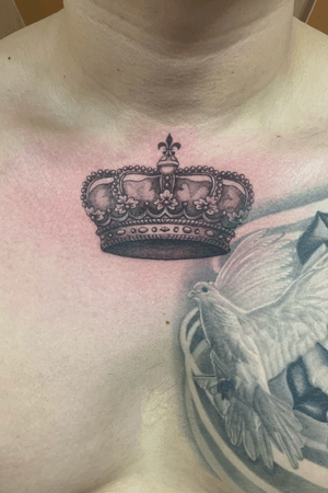 Mini crown tattoo