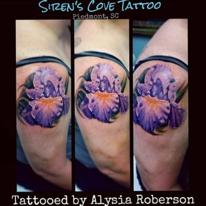 This purple iris flower turned out awesommme on her, tattooed by Alysia Roberson at Siren's Cove Tattoo in Piedmont, SC!!! :-D She came twice that day to get tattooed! #tattoos #tattooed #tattooedwomen #tattooartist #sc #sctattooartist #sctattooer #sctattooist #sctattoo #sctattooshop #sirenscove #siren #sirenscovetattoo #flowertattoo #girlytattoo #femaletattooartist  #alysiarobersontattoo #greenvillesc #downtowngreenville #iristattoo #andersonsc #clemsonsc #inkmaster #bestink #iris  #yeahthatgreenville #shouldertattoo #ink #inkedfemales #realism #realistictattoo #realistic #southcarolinatattooartist www.facebook.com/Alysia.Roberson.Tattoo.Artist www.facebook.com/sirenscovetattoo 