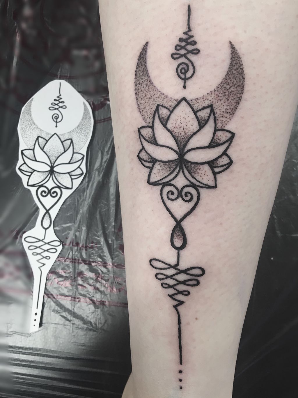 Dotwork blackwork unalome heel tattoo
