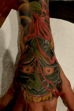 hand cover tattoo with Hannya mask 