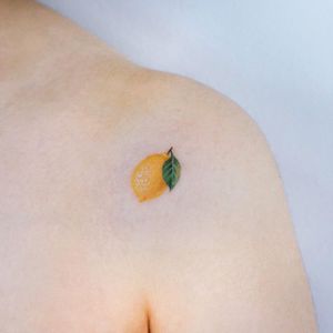 Tiny lemon tattoo by Haeny #Haeny #tinytattoos #tinytattoo #smalltattoo #small #tiny #minimal #mini