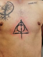 Deathly hallows sternum tattoo