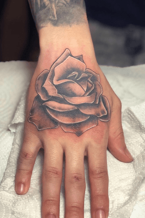 Hand rose tattoo 