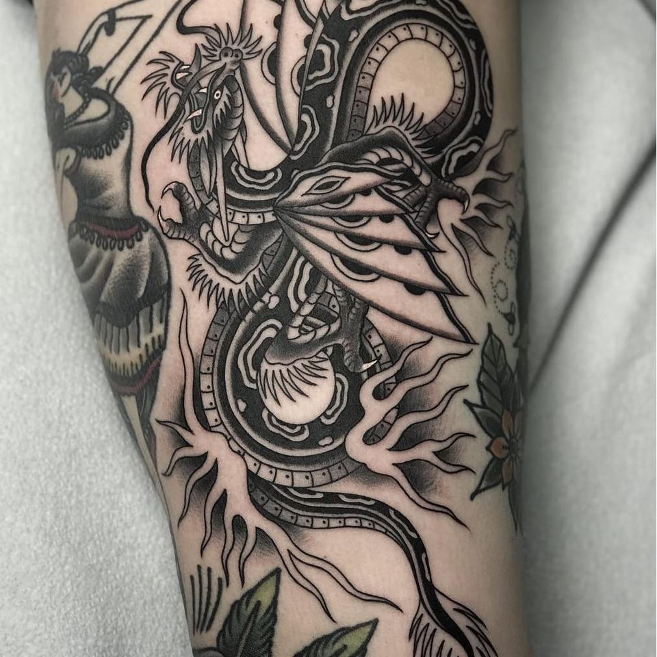 Dragon tattoo by Javier Betancourt #javierbetancourt #dragontattoos #dragontattoo #dragon #mythicalcreature #myth #legend #magic #fable