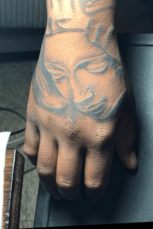 Virgin mary hand tattoo 