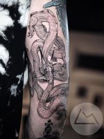 Dragon tattoo by Landon Morgan #LandonMorgan #tattooartist #besttattoos #awesometattoos #tattoosformen #tattoosforwomen #tattooidea #dragon #Linework #illustrative #ouroboros #darkart #fineline