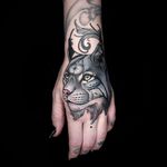 Hand tattoo by Maria Dolg #MariaDolg #tattooartist #besttattoos #awesometattoos #tattoosformen #tattoosforwomen #tattooidea #cat #Lynx #handtattoo #star #junglecat #petportrait #kitty #neotraditional
