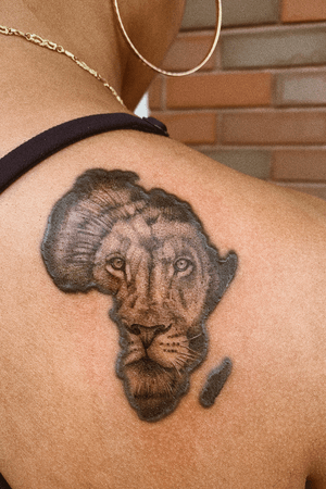 Lion face, Outline of Africa not done by me. 