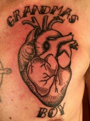 Dot work heart on a chest. 