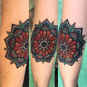 Traditional mandala flower on the elbow 