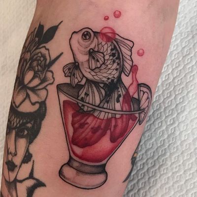 Fish tattoo by Sharon Mash #SharonMash #fishtattoo #fishtattoos #fish #seacreature #oceanlife #animal #ocean #water #pisces #nature #neotraditional #alcohol #cocktail #goldfish