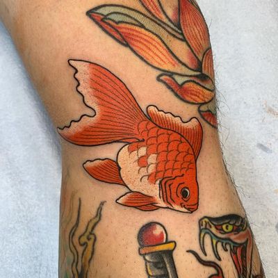 Fish tattoo by Yutaro aka Warriorism #Yutaro #Warriorism #fishtattoo #fishtattoos #fish #seacreature #oceanlife #animal #ocean #water #pisces #nature #Japanese #goldfish #color