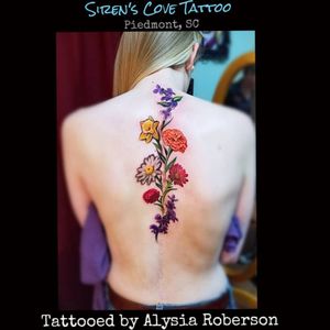 Tattooed flowers along a scar she has up her back! She sat great through this whole thing in 1 session! From the bottom to the top: Sweet peas, chrysanthemum, daisy, calendula, marigold, daffodil, and violets... few family members' birth flower, tattooed by Alysia Roberson at Siren's Cove Tattoo in Piedmont, SC! #flowertattoo #chrysanthemumtattoo #chrysanthemum   #sweetpea #sweetpeas #sweetpeastattoo #violet  #flowerstattoo #backtattoo #backpiece #flowers #marigold #marigoldtattoo # #scartatttoo #tattooedscar #scarred #scar #scars #realistictattoo #prettytattoo #pretty  #prettyinink  #birthflower #daisytattoo #daisy #daffodil #daffodiltattoo  #flowergarden #springflowers #girlytattoo #tattoos #tattooed #tattooedwomen #tattooedwoman #inkedgirls #inkedgirl #inkedfemales #sc #sctattoo #sctattooartist #sctattooshop #sctattooist #sctattooer #southcarolinatattooartist #greenvillesc #downtowngreenville #spring #clemsonsc #Alysiarobersontattoo #sirenscovetattoo www.facebook.com/sirenscovetattoo www.facebook.com/Alysia.Roberson.Tattoo.Artist