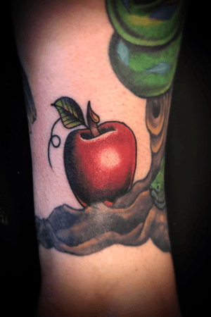 Apple of eden tattoo on the Leg