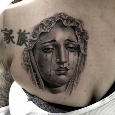 Virgin Mary tattoo by Freddy Negrete #FreddyNegrete #Chicanotattoos #chicanotattoo #chicanx #chicano #chicana #CincodeMayo #Mexican #Mexico #tattooinspiration #besttattoos
