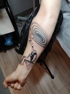 Space dreamer tattoo