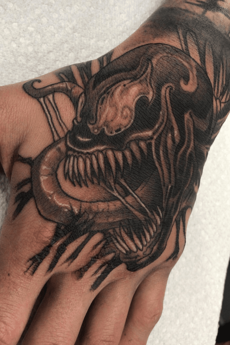 Tattoo uploaded by Eddie Havlovic • Venom hand piece done by freddie