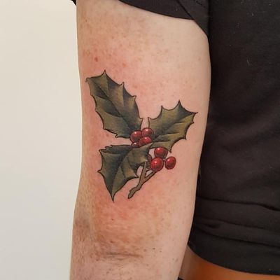 Birth month flower tattoo by Cori Henderson #CoriHenderson #holly #birthmonthflowertattoos #birthmonthflowers #flowertattoo #flowers #florals #petals #blooms #leaves #nature #plant #birthmonth