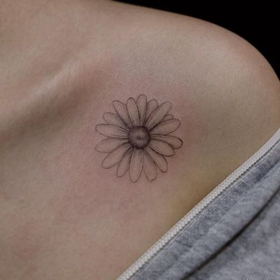 Birth month flower tattoo by Erica Bae #EricaBae #daisy #birthmonthflowertattoos #birthmonthflowers #flowertattoo #flowers #florals #petals #blooms #leaves #nature #plant #birthmonth