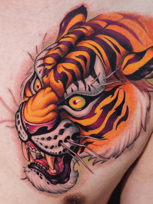 Tiger on chest.