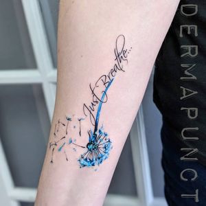 Watercolor dandelion tattoo.
