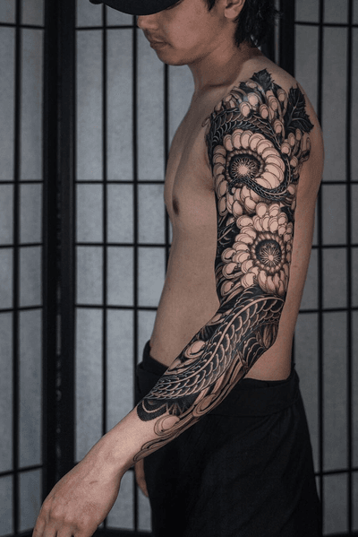 Snake and chrysanthemum arm sleeve.