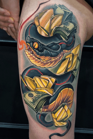 Snake and gold bar on leg.