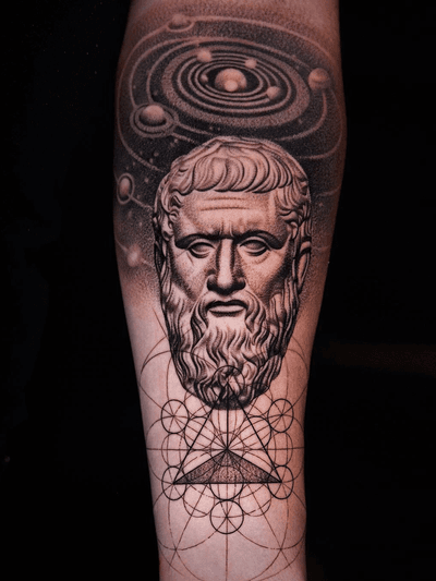Plato and universe theme on arm.