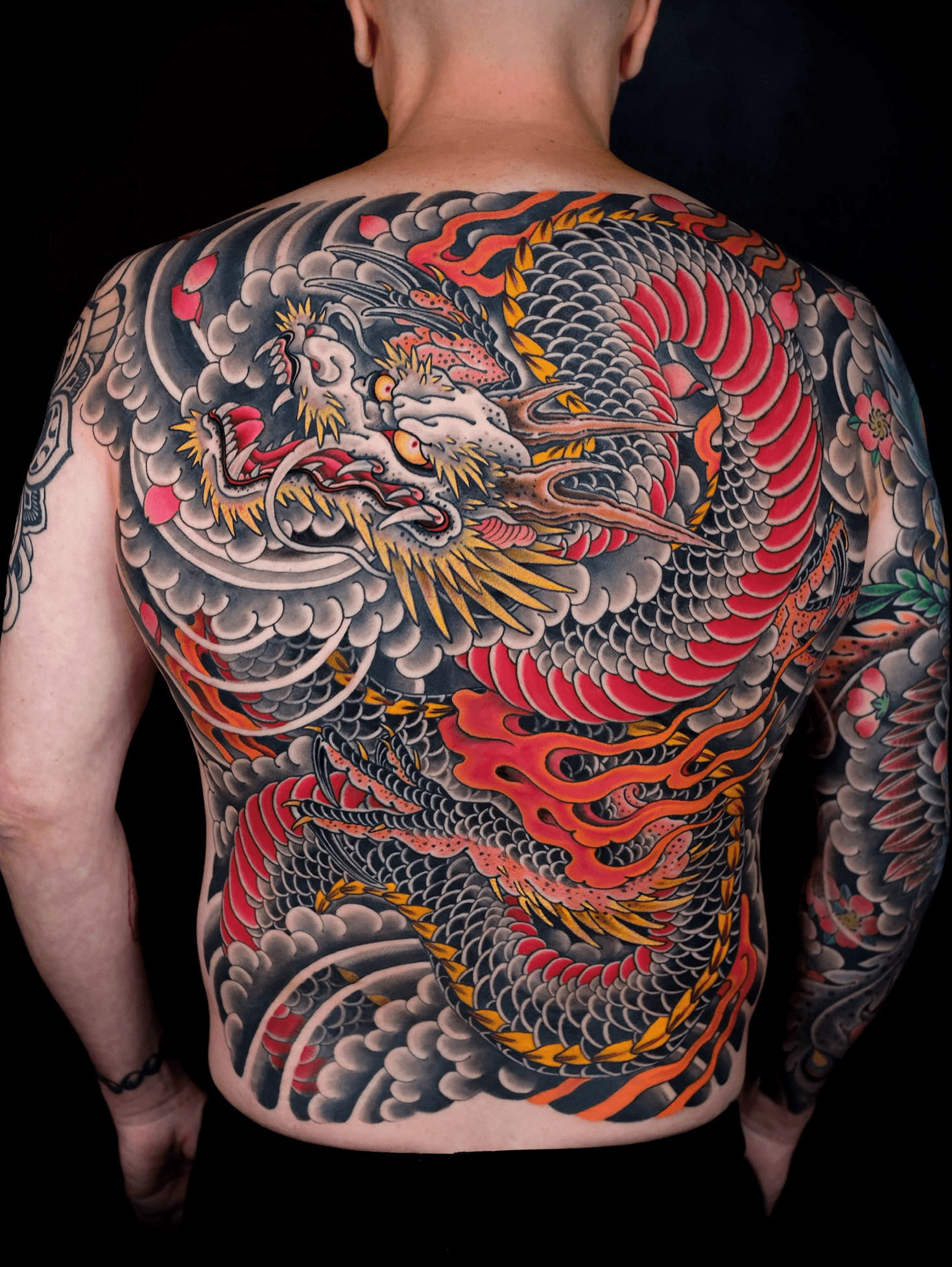 Top 75+ dragon back tattoo - in.eteachers