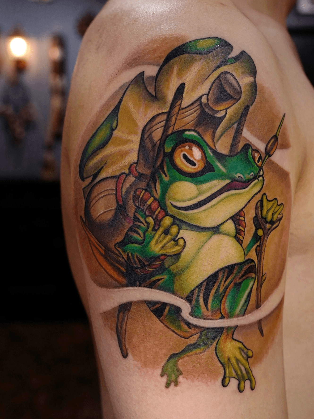 Cartoon Frog With Flowers Tattoo Idea