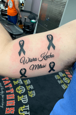 Thanks to @iamricotattoos for the dope tattoo. This is my first tattoo 2 years in the making it’s very meaningful to me the words in the middle mean faith love and family and in all 4 of the ribbons are for the people who have touched my life and have died of cancer 