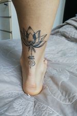 Recent tattoo done in Singapore by Moon from Moonstruck Tattoo. I wanted to have a symbol of Asia, and I got it: a lotus flower combined with unalome and epephant's long eyelashes.