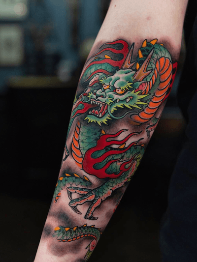 Mini dragon on forearm.