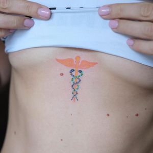 Symbol tattoo by Yaroslav Putyata #YaroslavPutyata #symboltattoo #symboltattoos #symbol #symbols #tattooswithmeaning #meaningfultattoo #Caduceus #snake #medicine #wings 