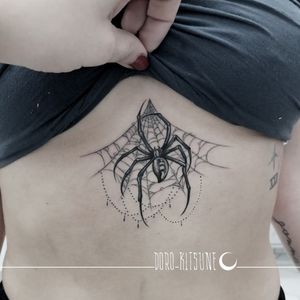 Spider tattoo, black widow with classic spiderweb
