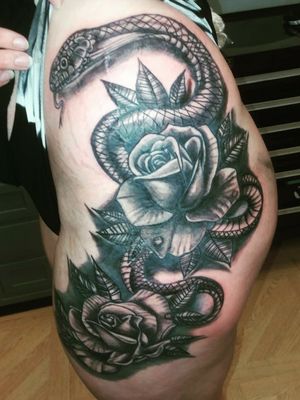 Large  lack and Grey Snake and Rose Tattoo that i recently finished for a customer. #inklifestyle #crazydayztattoo4life #phucstyxtattoosupply #724tattooartist #TattooSteveD #blackandgreytattoos 