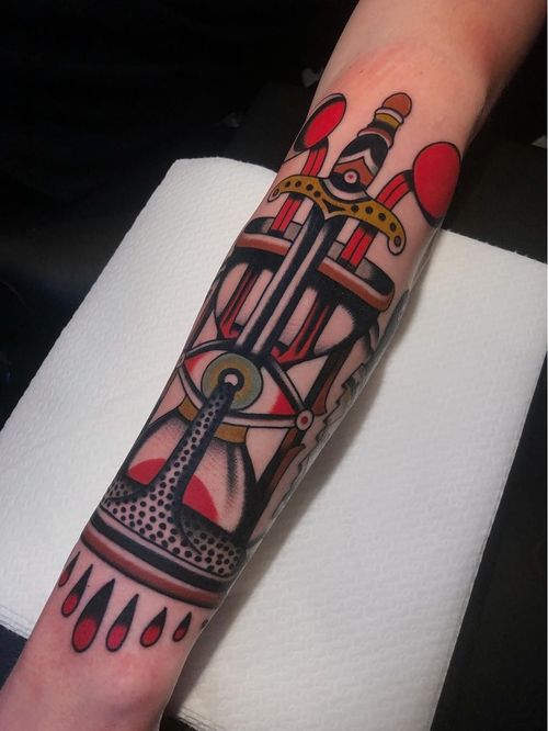 Symbol tattoo by Bob Geerts #BobGeerts #symboltattoo #symboltattoos #symbol #symbols #tattooswithmeaning #meaningfultattoo #hourglass #traditional #sword #eye