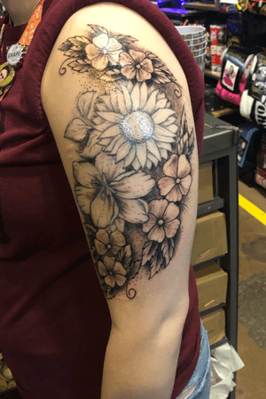 Done by Jim at Jims Tattoo Studio in Seabrook NH #flowers #arm #bicep #floral