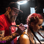 Live Tattooing at my Tattoo Easter Fest 21 of April. Vicious Rumors logo...on VR singer’s girl...during their show.