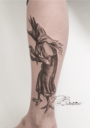 Get bewitched with an illustrative blackwork tattoo by Patrick Bates, perfect for your lower leg.