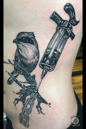 Finch, syringe, bike chain tattoo. Custom piece for a BMX client!!