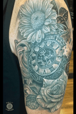 Floral clockwork tattoo