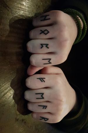 Nordic runes Elder futhark left hand says hope the right says fear 