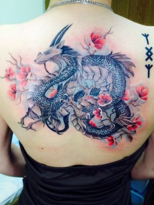Feminine dragon tattoo