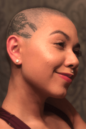Scorpion scalp tattoo