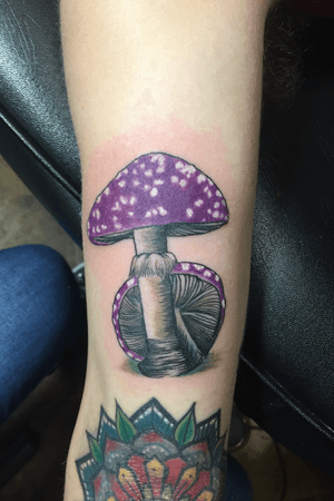 Illustrative color mushroom on the back of arm 