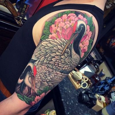 Crane tattoo by Chris Crooks #ChrisCrooks #cranetattoos #crane #birds #feathers #wings #flying #animal #nature #Japanese #color #peony